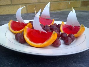 Jelly boats and fruit on a plate