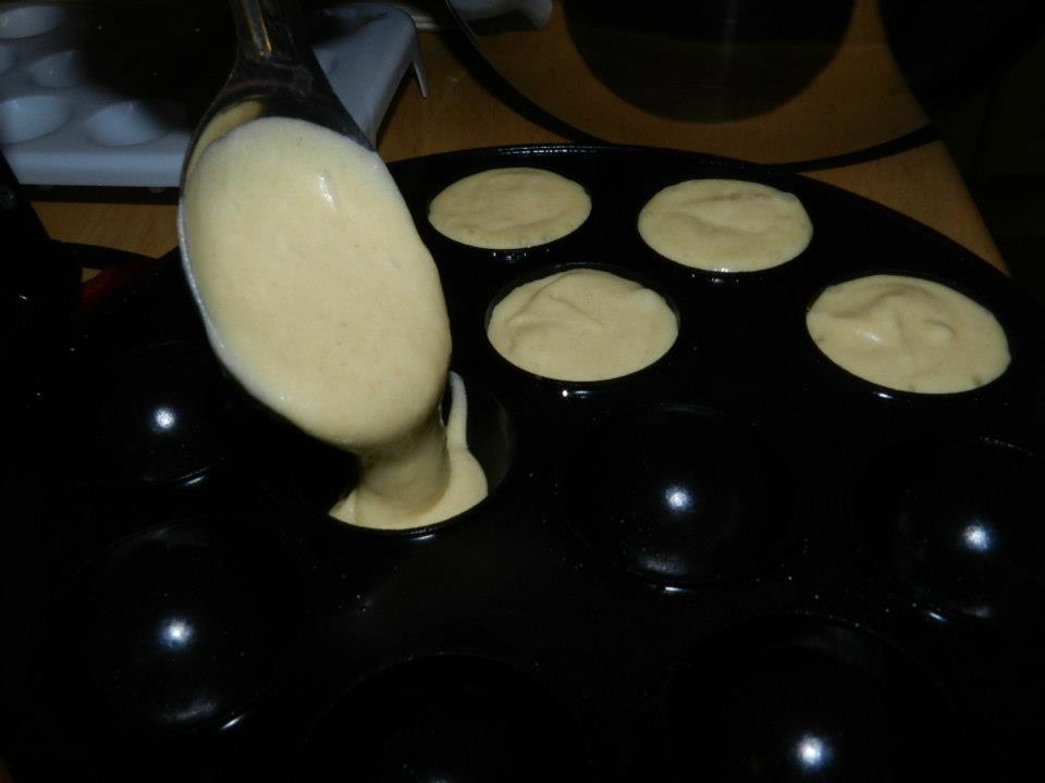 Cake batter being put in machine
