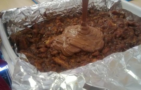 Melted chocolate spreading over base