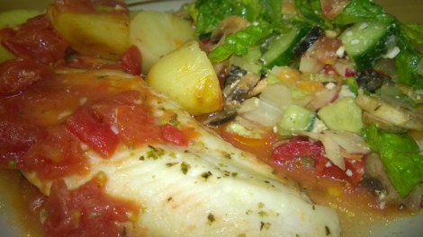 Fish and salad on plate