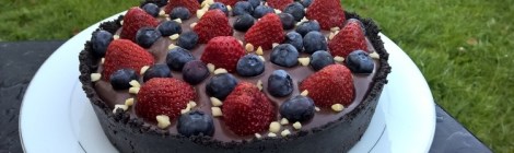 Chocolate tart with strawberries and blueberries